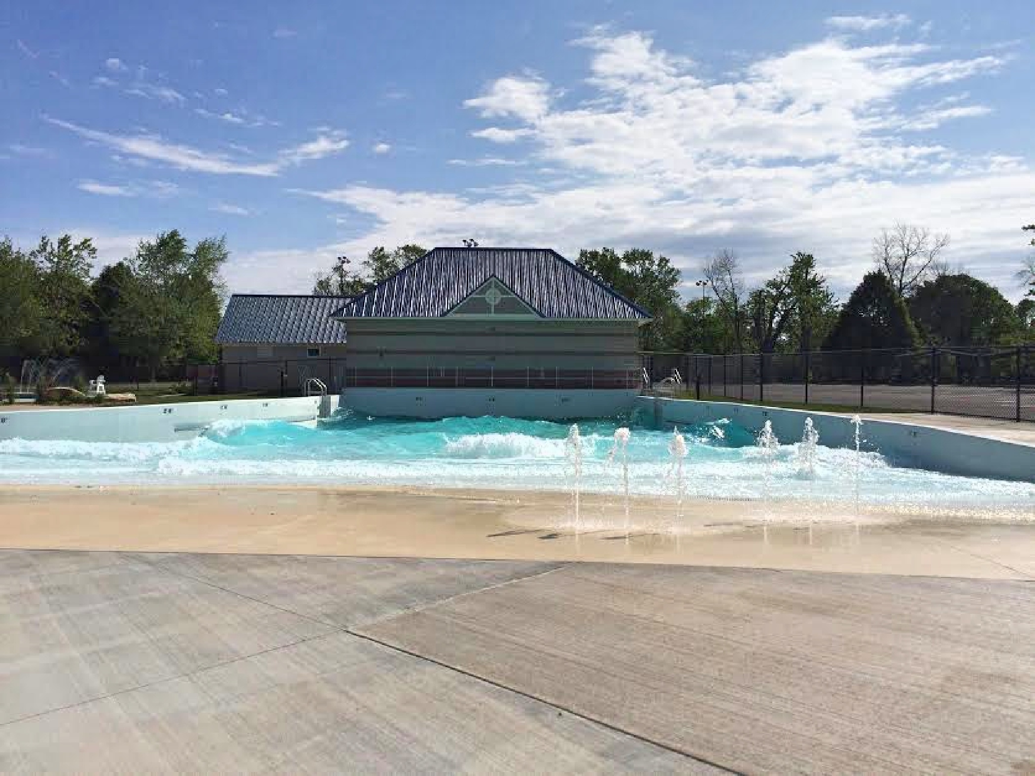 Wavepool entry with water spouts